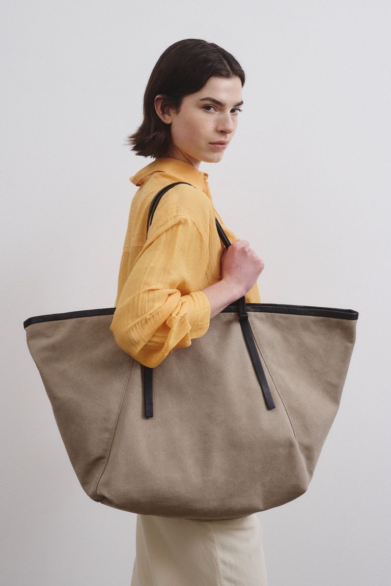 Sac de voyage en toile de coton avec bords en cuir