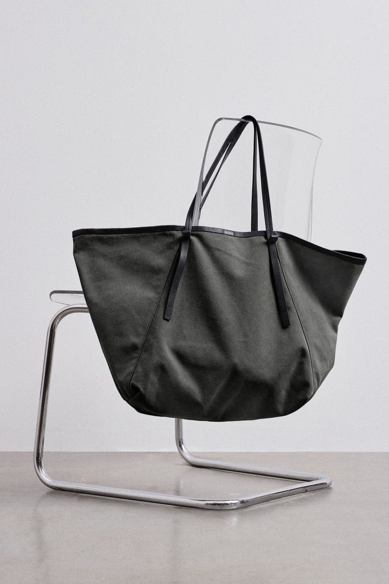 Borsa da viaggio in canvas di cotone con profili in pelle