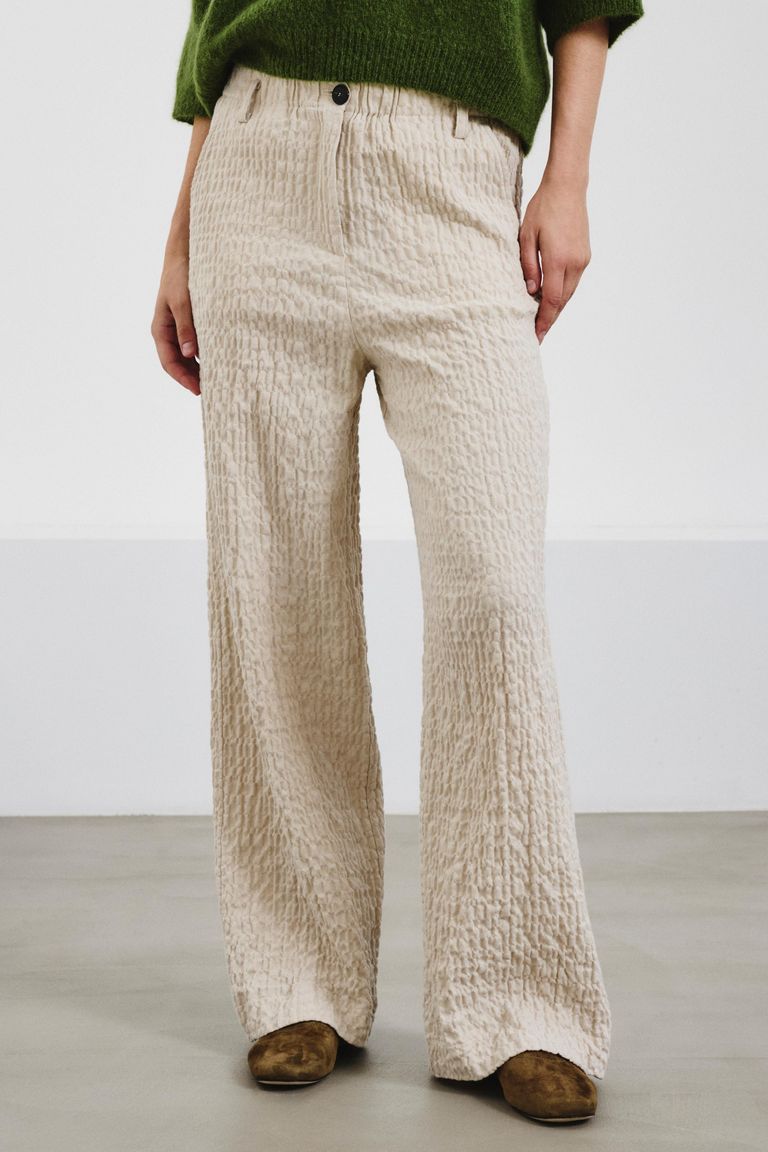 Trousers in embossed micro-herringbone cotton