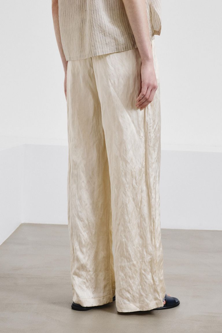 Crinkled viscose satin trousers lime white
